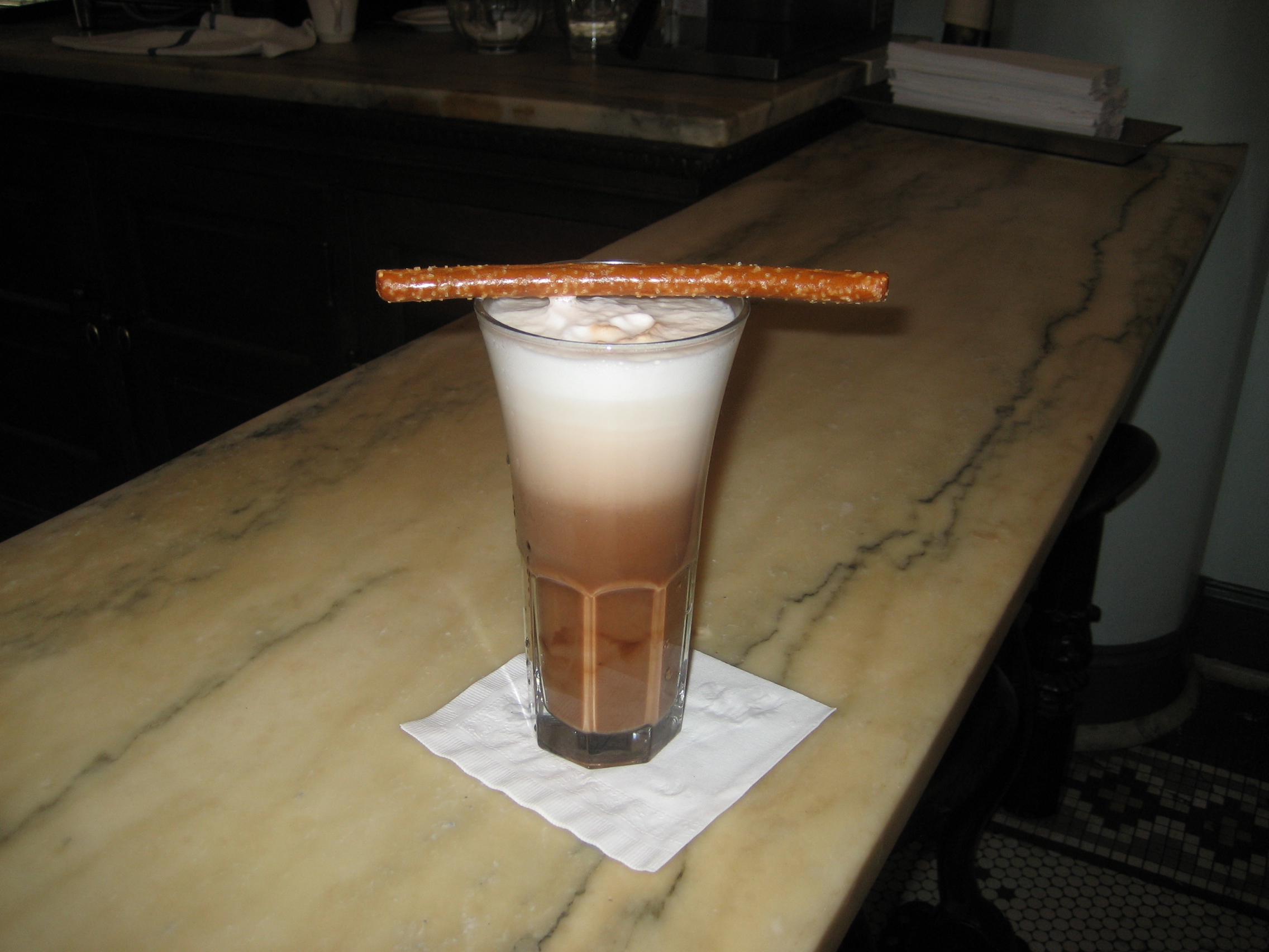 An egg cream and a pretzle